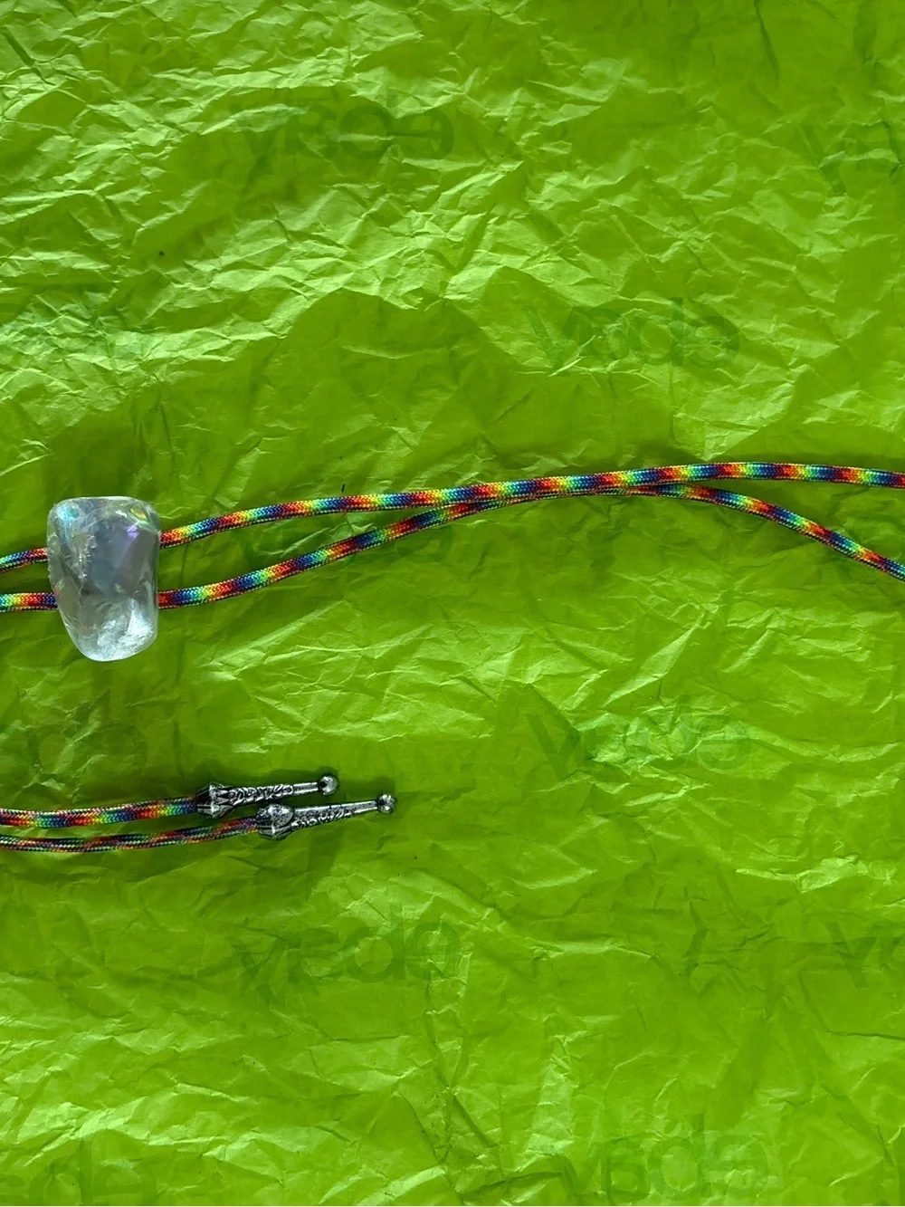 Clear Glass Pendant with Rainbow Cord Bolo Tie